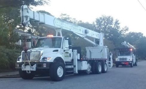 Chestang Tree Service crew and bucket truck