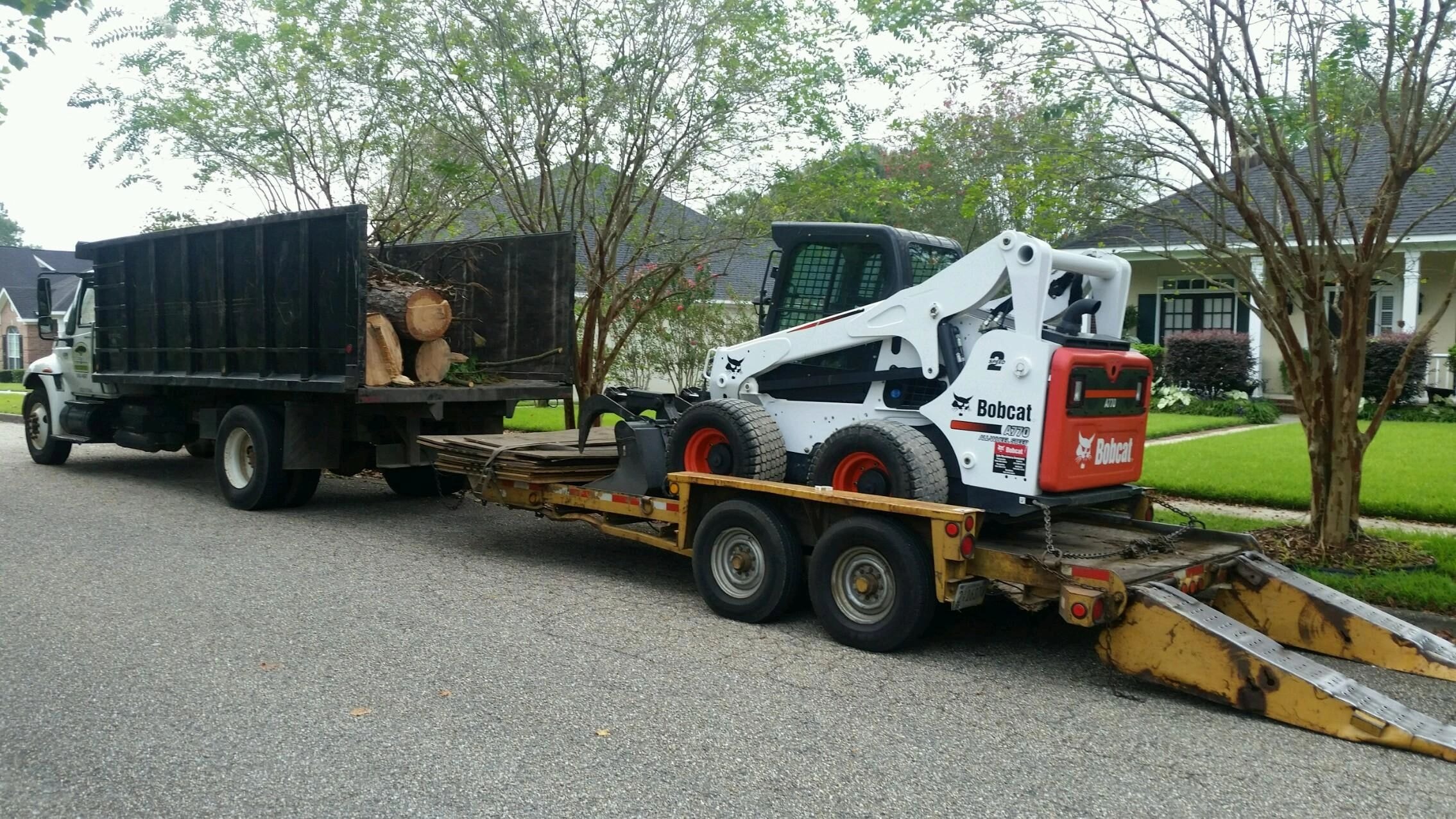 Chestang Tree Service equipment and dump truck